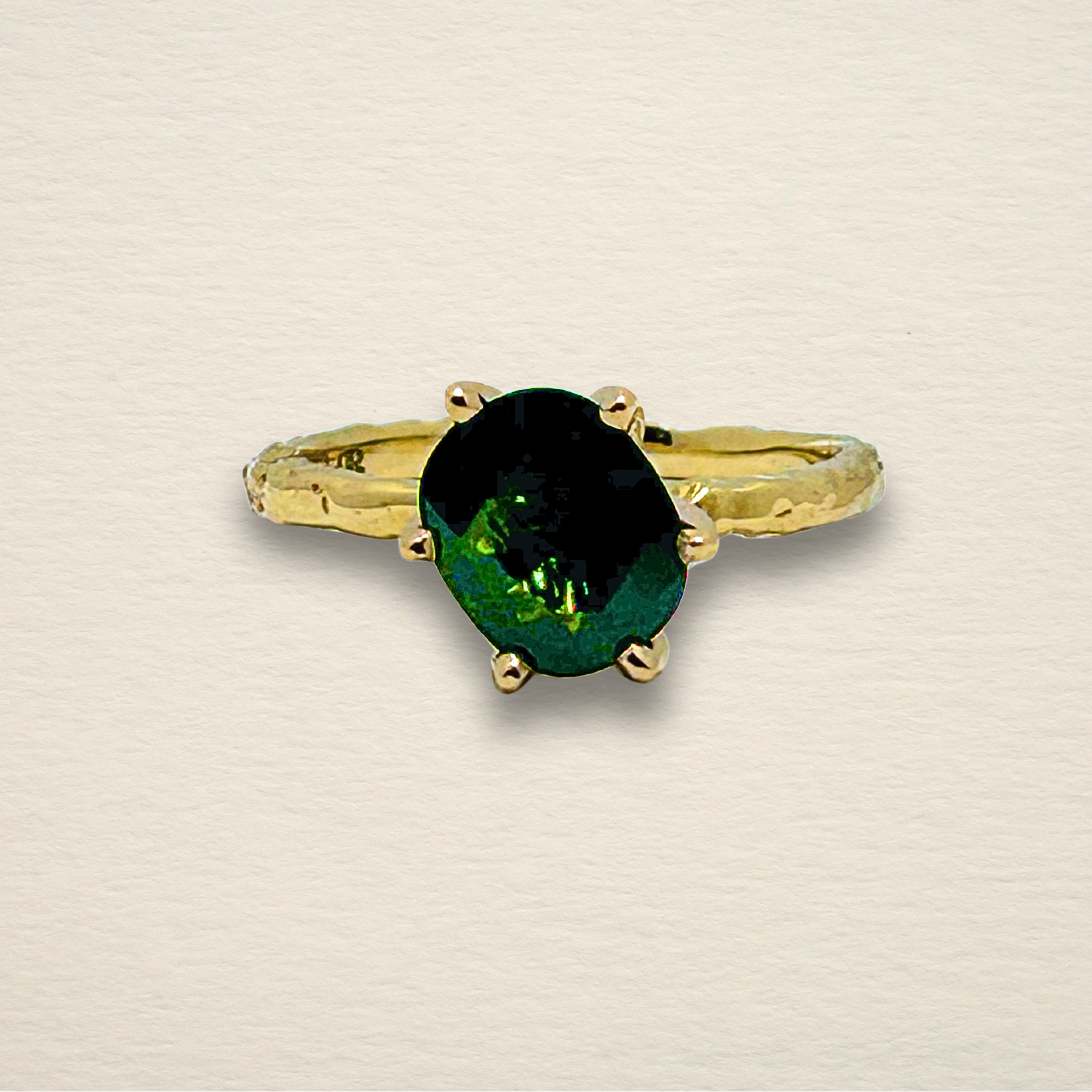 The Archive Series Green Sapphire Oval: a 1.85ct oval-cut green sapphire set on a northwest-southeast diagonal within a bespoke 6-prong 18k yellow gold mounting, master-fabricated in Chicago.