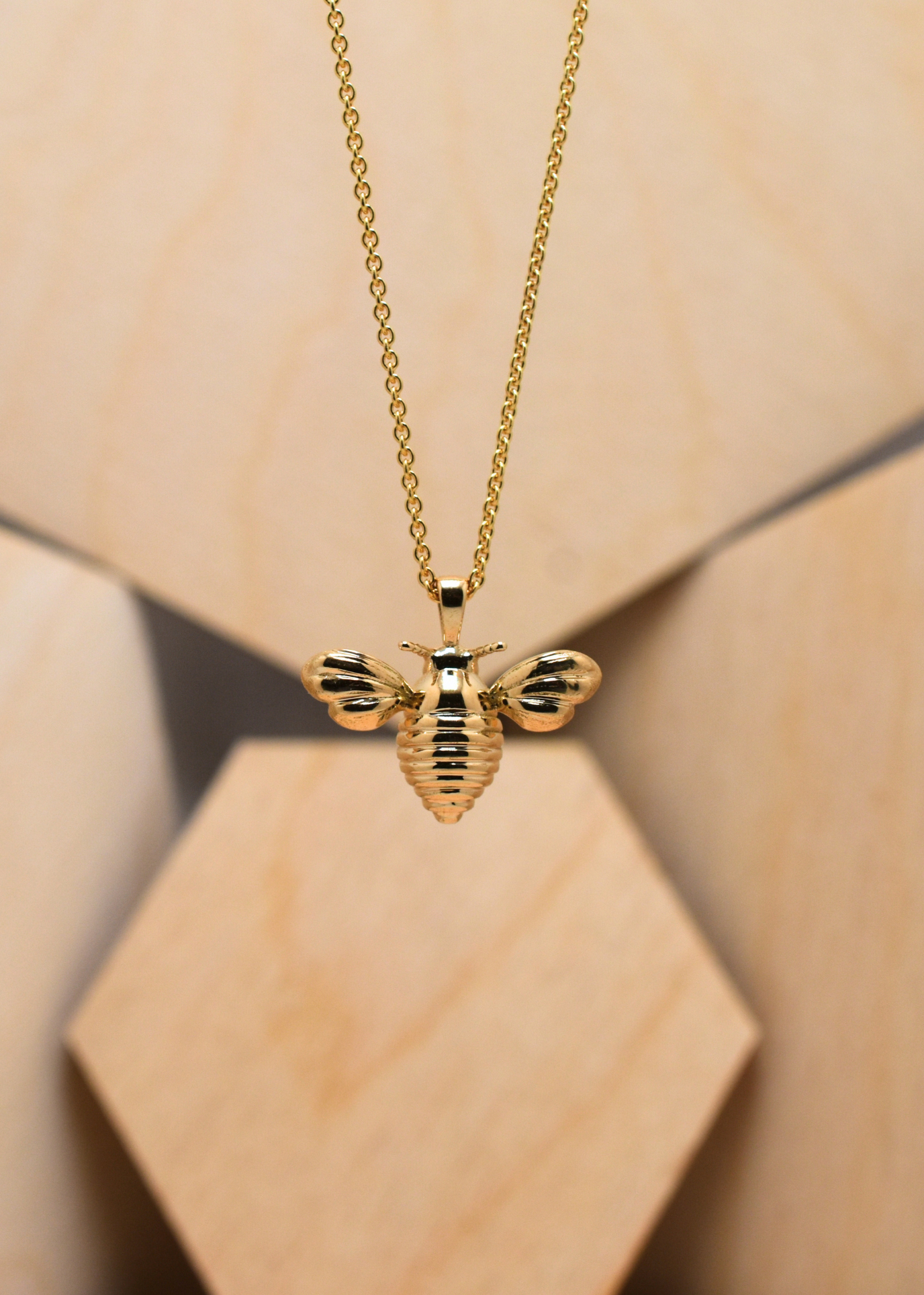 gold bee pendant