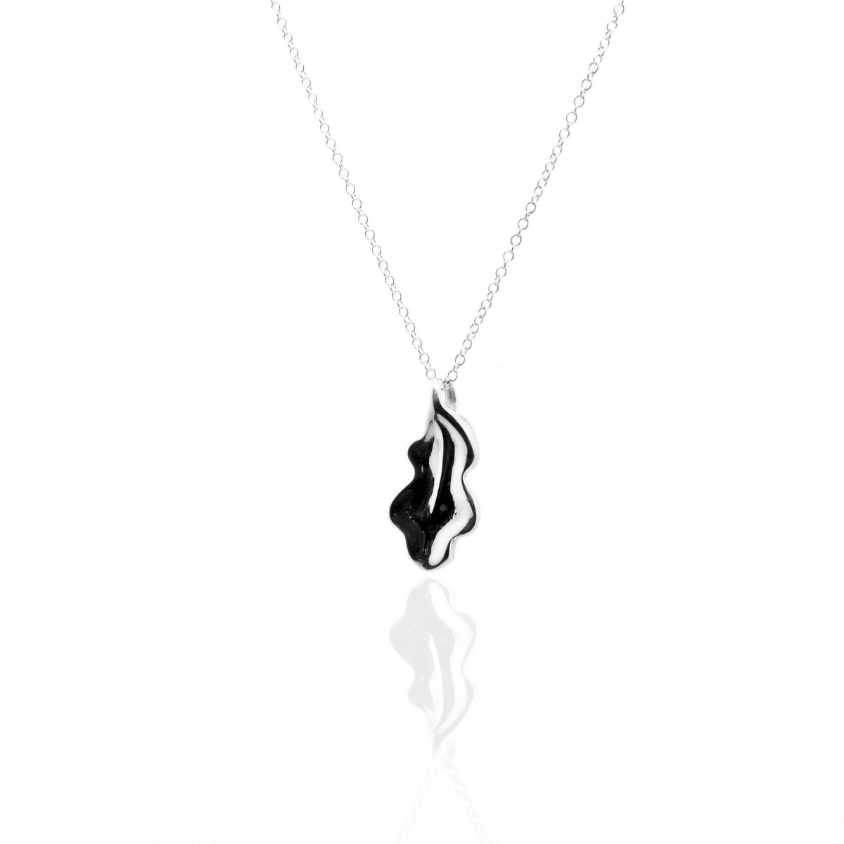 Angled side perspective of the Botanical Oak Leaf Pendant 20mm grande in sterling silver, displaying the integrated bail and organic sculptural contour by Gina Rose Atelier.