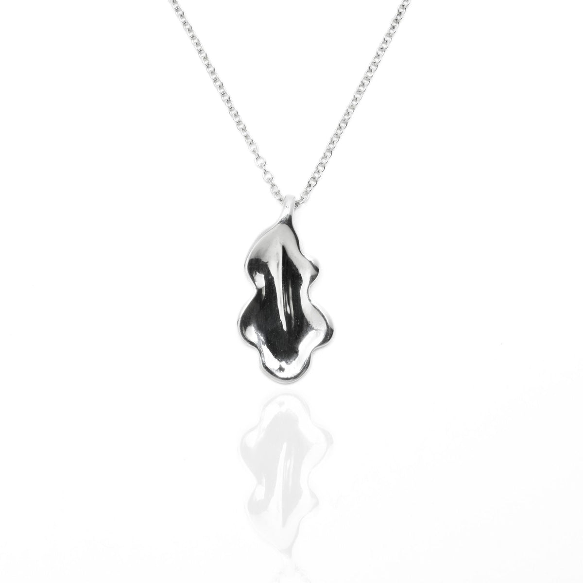 Direct studio front view of the Botanical Oak Leaf Pendant 20mm grande in solid sterling silver, emphasizing tactile volume and fine jewelry craftsmanship