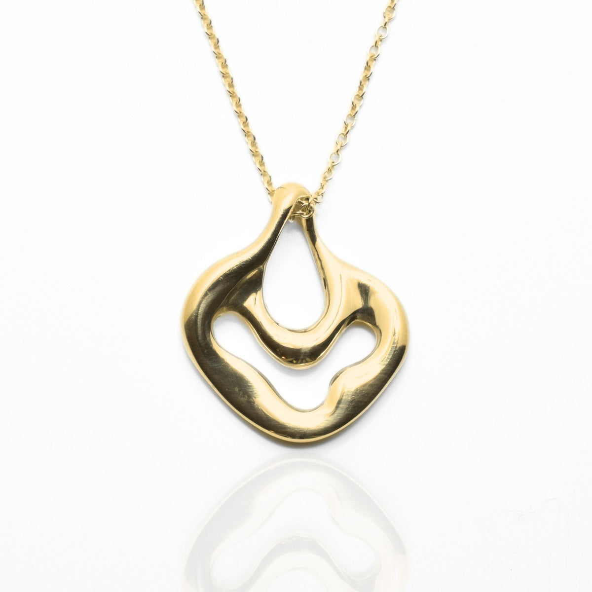 Close-up front view of the Pelagic Sea Fan Pendant 17mm petite in 18k yellow gold, showcasing master-crafted organic openwork coral geometry and polished finish by Gina Rose Atelier.