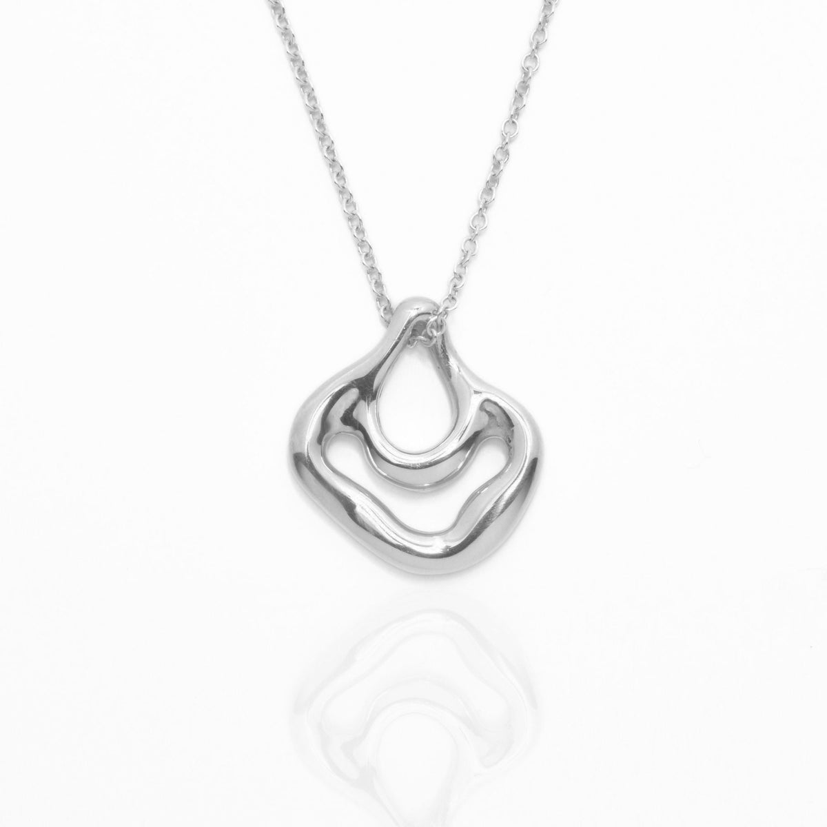 Direct studio front view of the Pelagic Sea Fan Pendant 21mm moyen in solid sterling silver, emphasizing tactile volume and fine jewelry craftsmanship