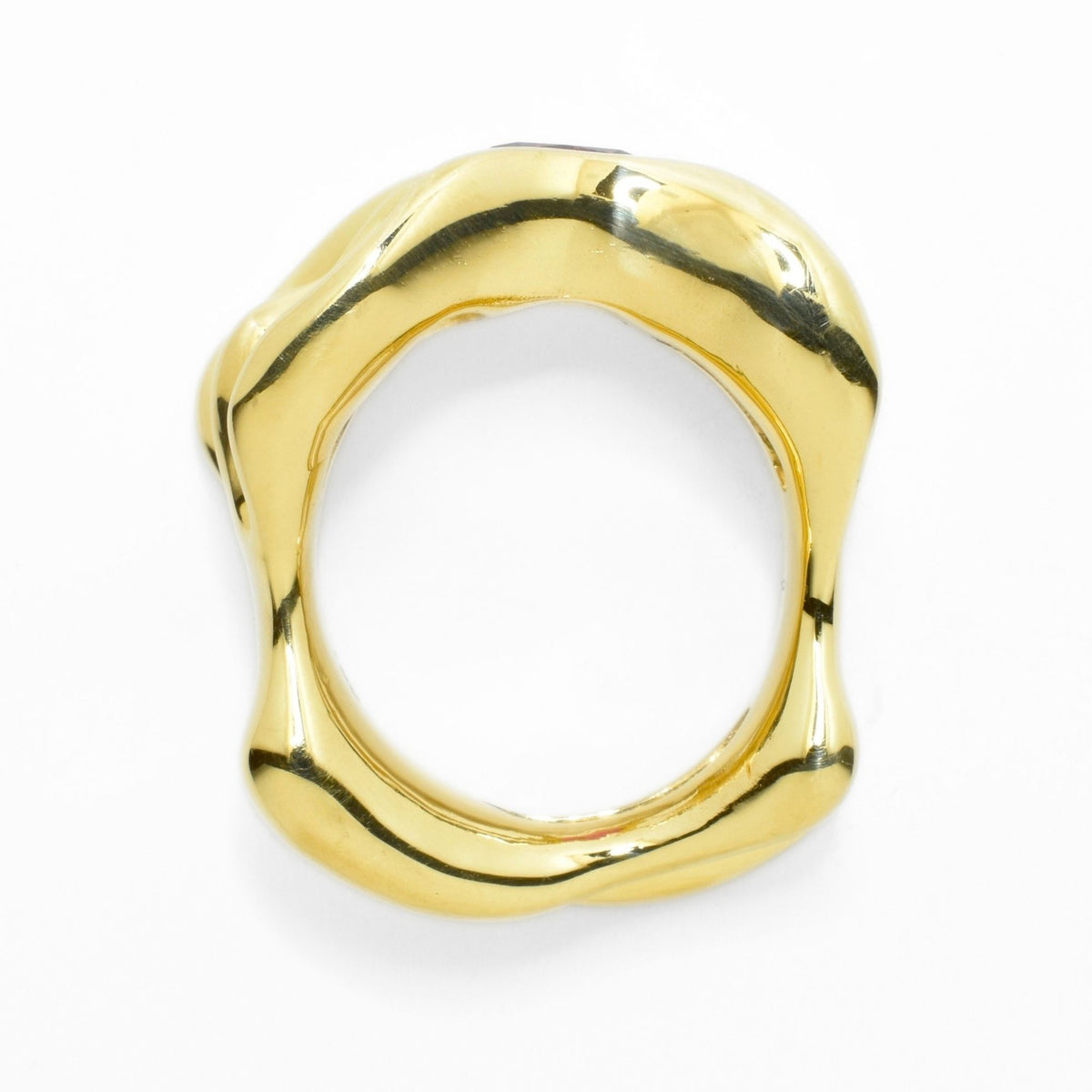 Profile view of the Red Spinel Master Ring from the Archive Series in solid 18k yellow gold, displaying the organic interior contour and polished finish by Gina Rose Atelier