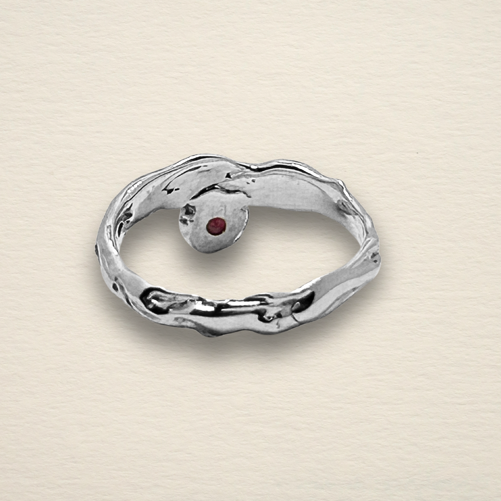 Underside view of the Archive Series Rhodolite Garnet ring, displaying the hallmark of authentic master goldsmithing with precise, hand-finished metalwork in recycled sterling silver.