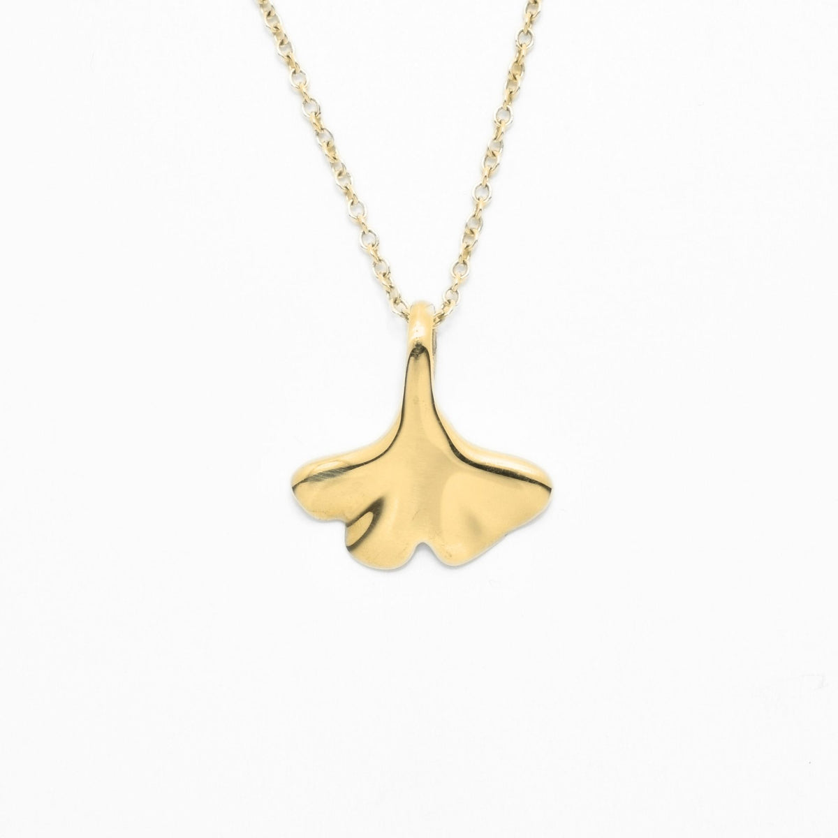The Botanical Ginkgo Leaf Pendant in 14mm petite scale crafted in solid 18k yellow gold by Gina Rose Atelier, shown hanging on a custom gold chain against a clean studio background