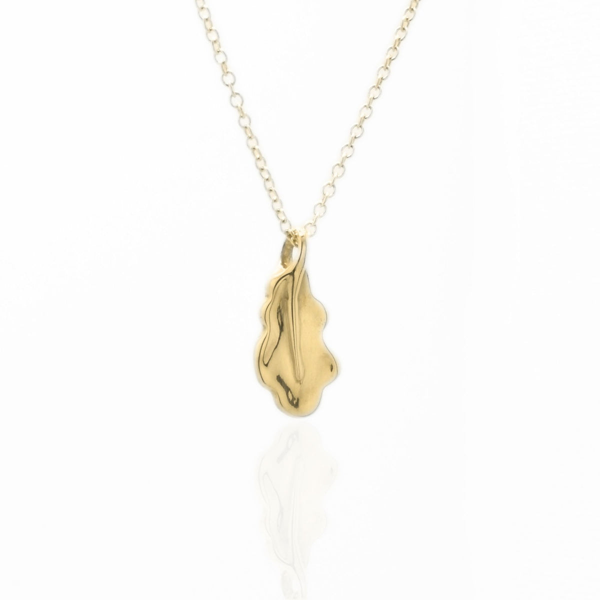 Close-up front view of the Botanical Oak Leaf Pendant 15mm petite in 18k yellow gold, showcasing master-crafted organic lobed geometry and polished finish.