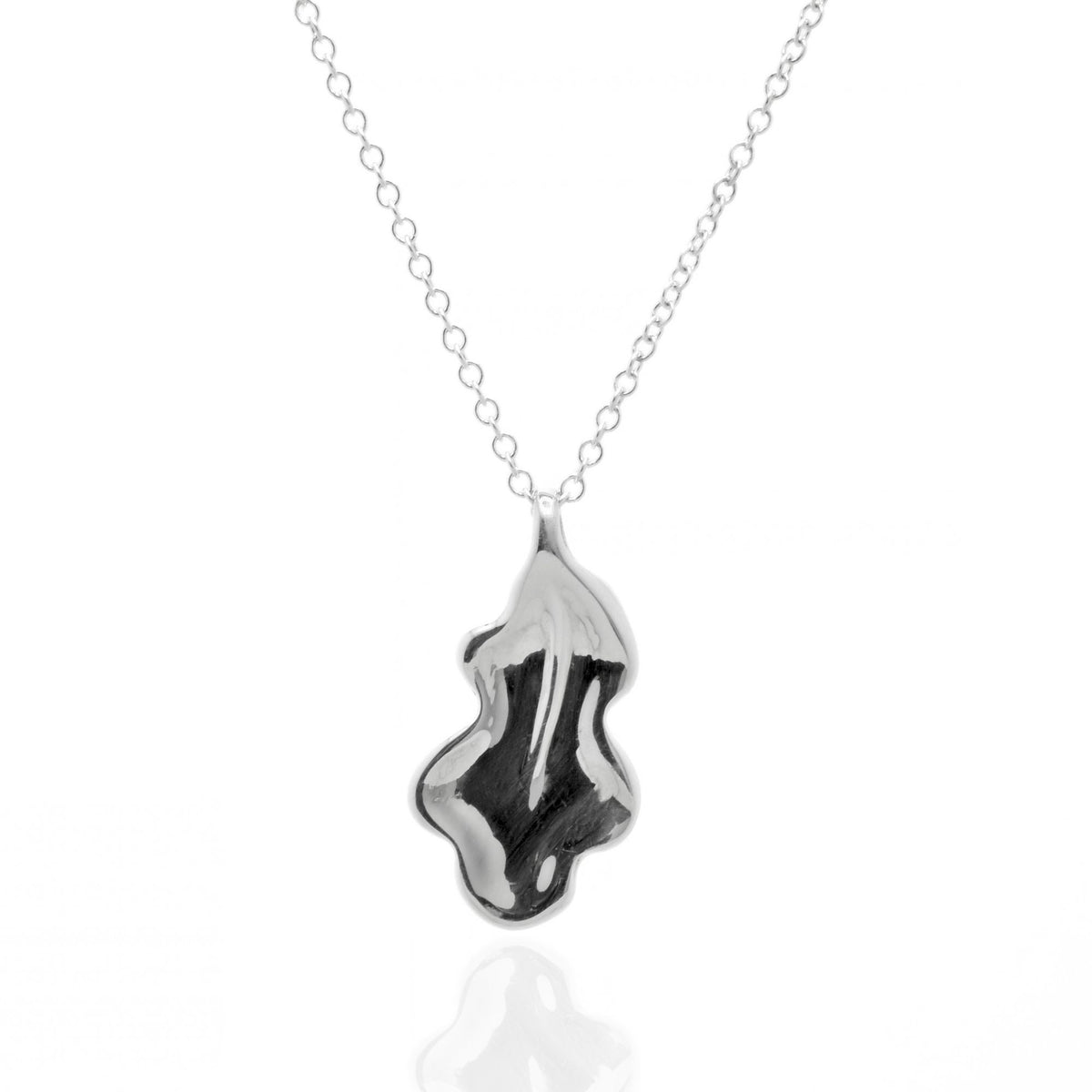 The Botanical Oak Leaf Pendant in 20mm grande scale crafted in solid sterling silver by Gina Rose Atelier, shown with a mirror studio reflection on a custom silver chain