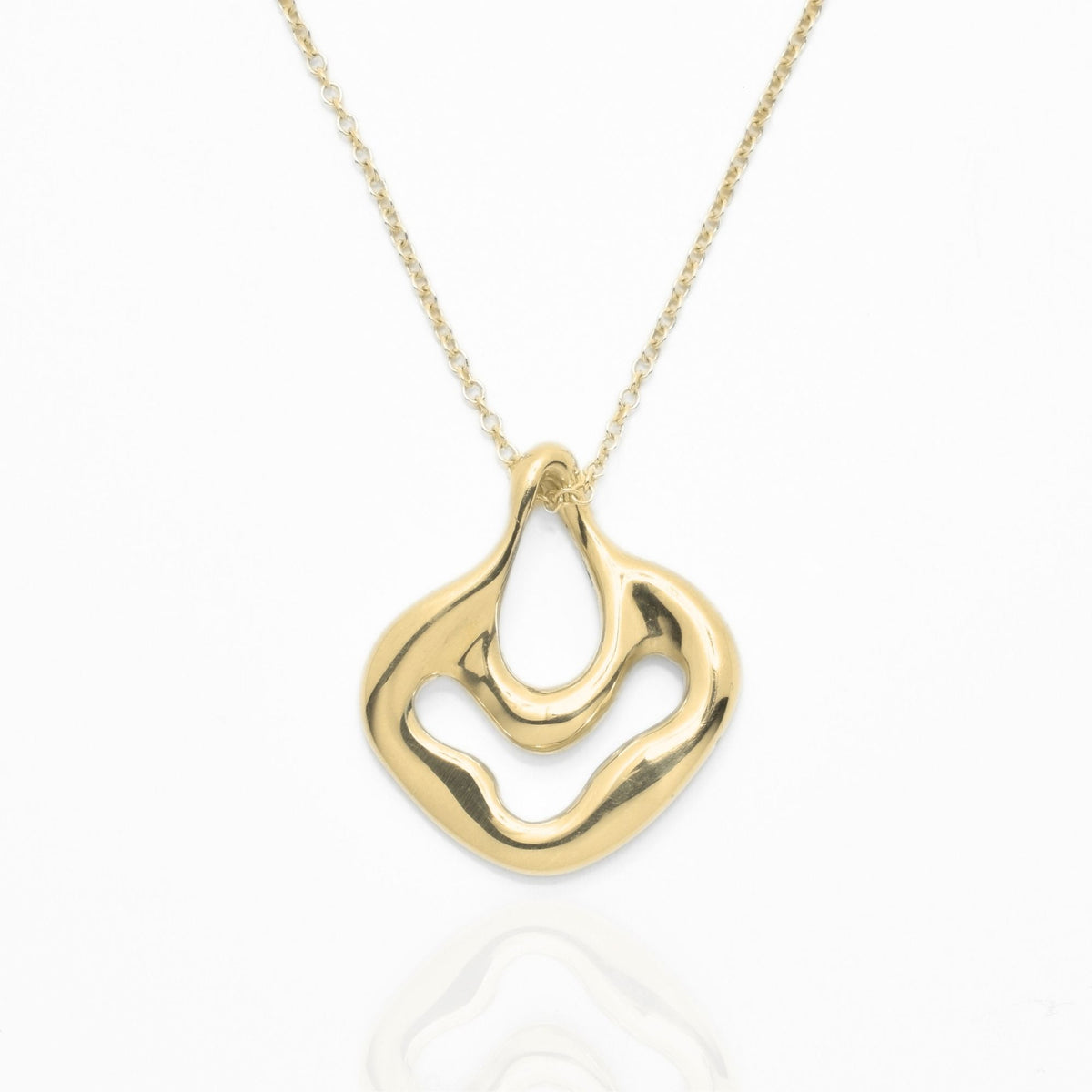 Direct studio front view of the Pelagic Sea Fan Pendant 17mm petite in solid 18k yellow gold, emphasizing tactile volume and fine jewelry craftsmanship