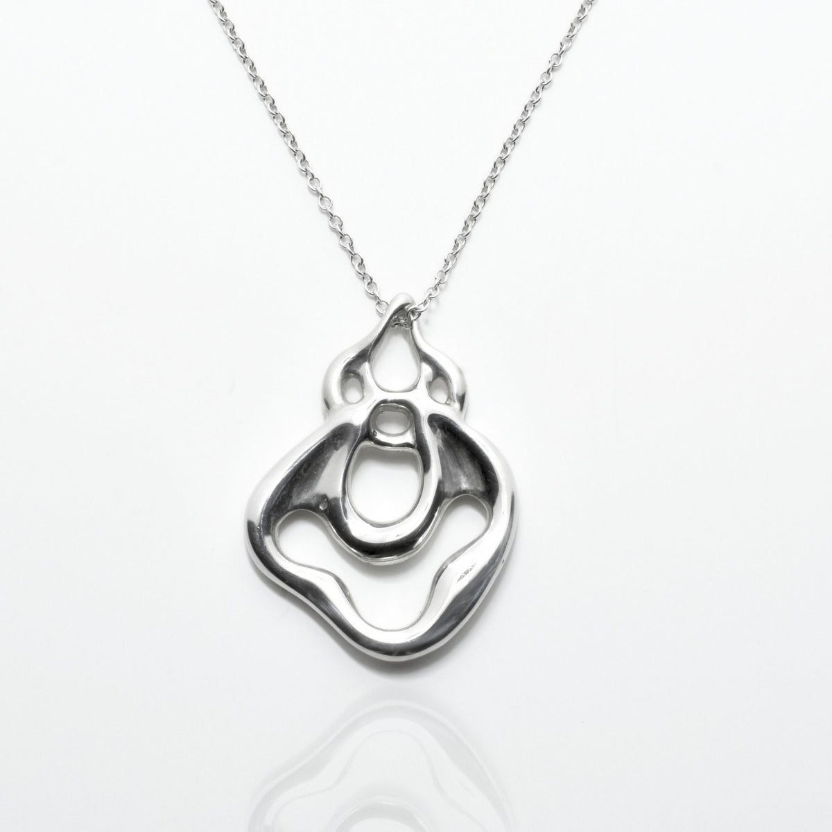 Direct studio front view of the Pelagic Sea Fan Pendant 29mm grande in solid sterling silver, emphasizing tactile volume and fine jewelry craftsmanship