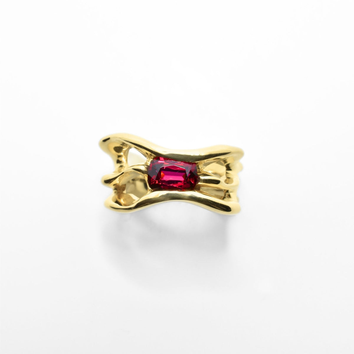The Red Spinel Master Ring from the Archive Series crafted in solid 18k yellow gold featuring an exceptional red spinel center stone by Gina Rose Atelier, shown against a clean studio background.