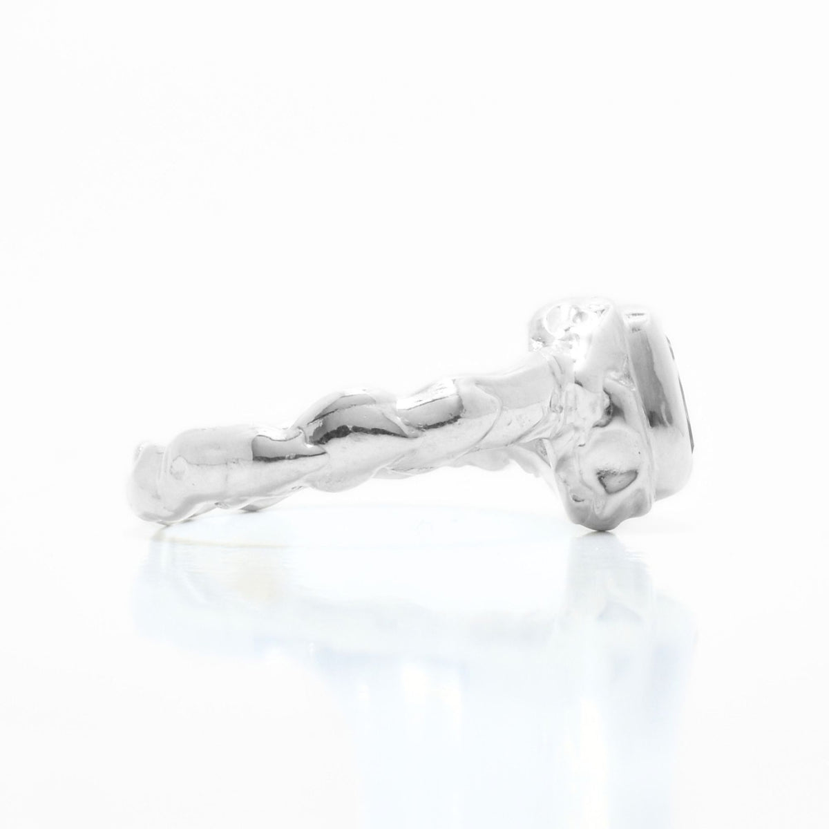 Side profile view of the Trillion Citrine Solitaire ring from the Archive Series in solid sterling silver, displaying the organic textured band and bezel architecture by Gina Rose Atelier.